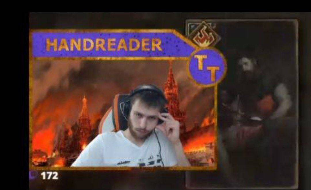 Screenshot of the Handreader stream: the burning Kremlin on the background